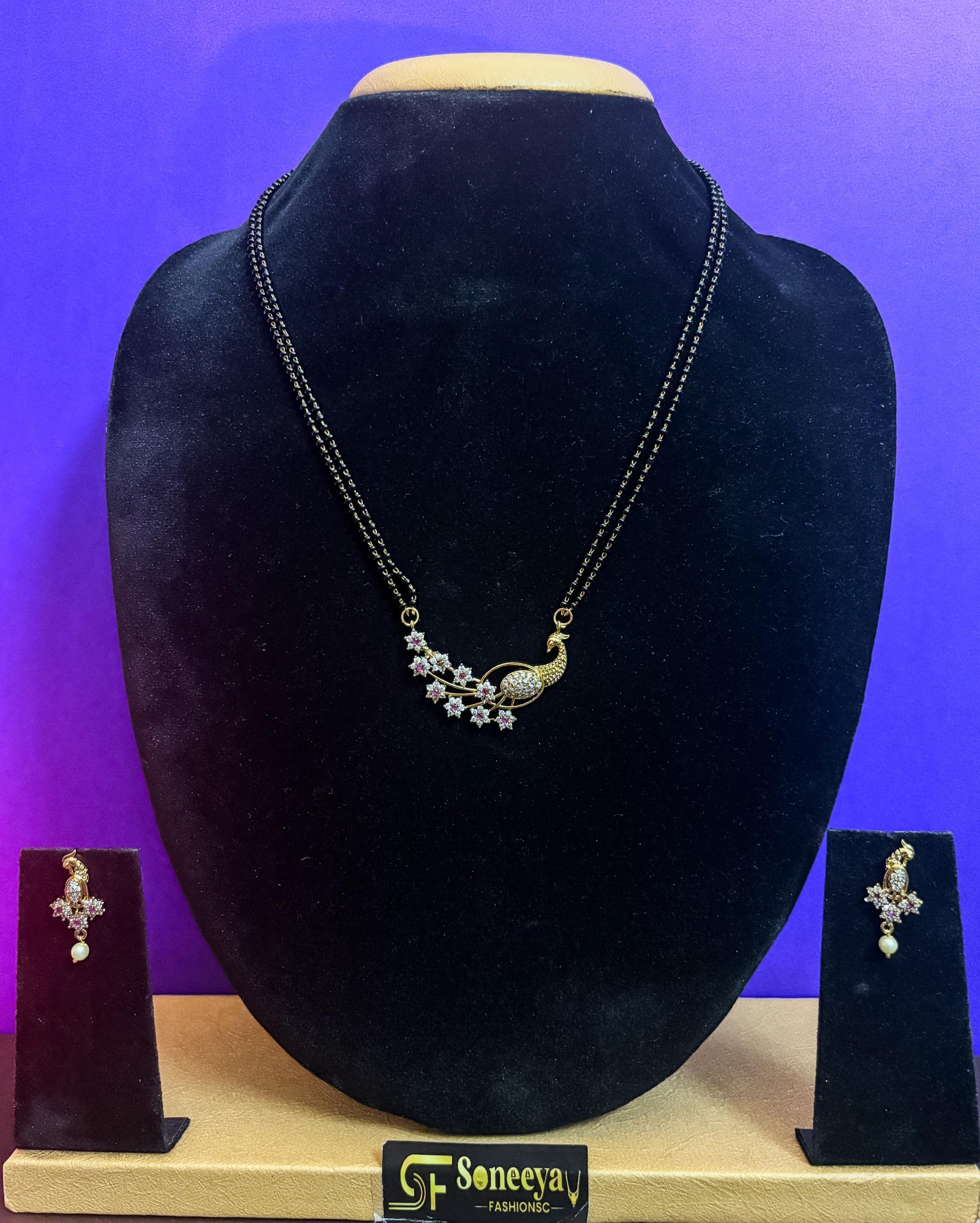 Peacock Design Black and Gold Necklace with Earrings